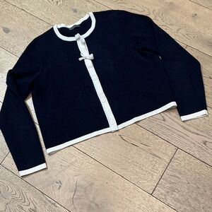 Woman’s Adrianna Papell navy and cream sweater jacket. Medium.Button front. Cute